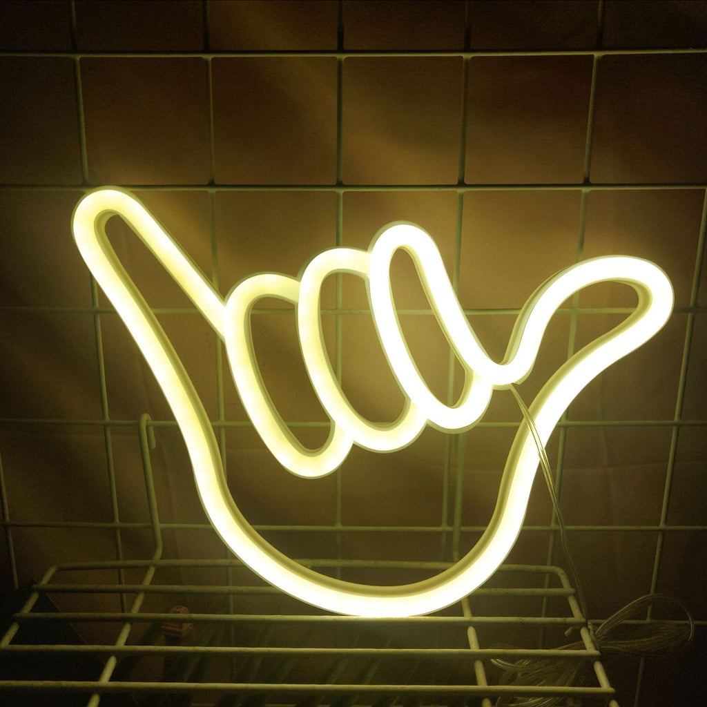 Neon finger sign as photography and content creator prop