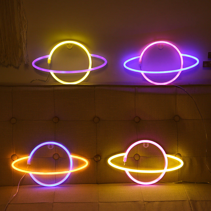 Lumora Planet Neon Light blue and yellow planet glowing on wall