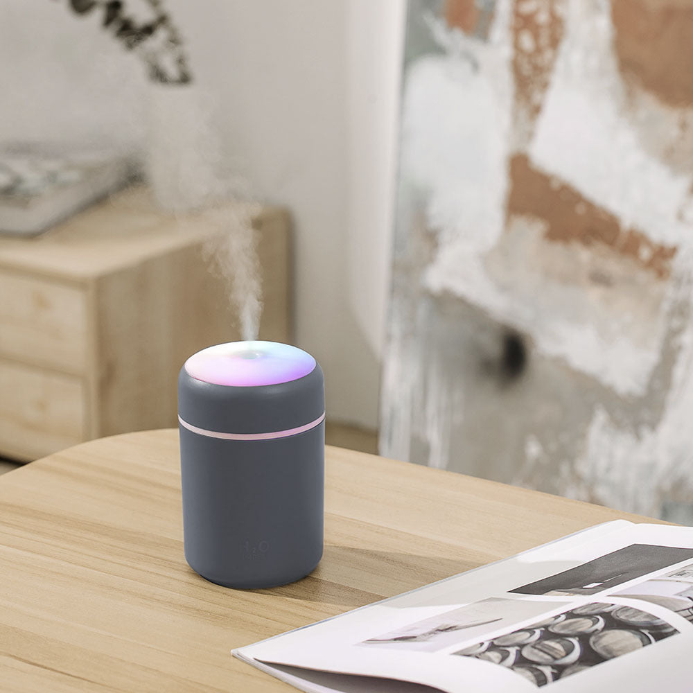 Mini humidifier in pink with essential oil aromatherapy function