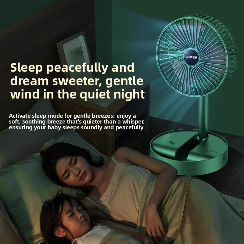 Foldable fan in emerald green with built-in phone holder in use