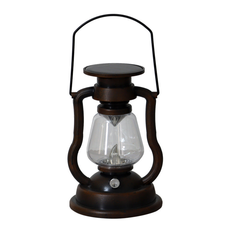 Vintage LED lantern flame mode glowing at dusk