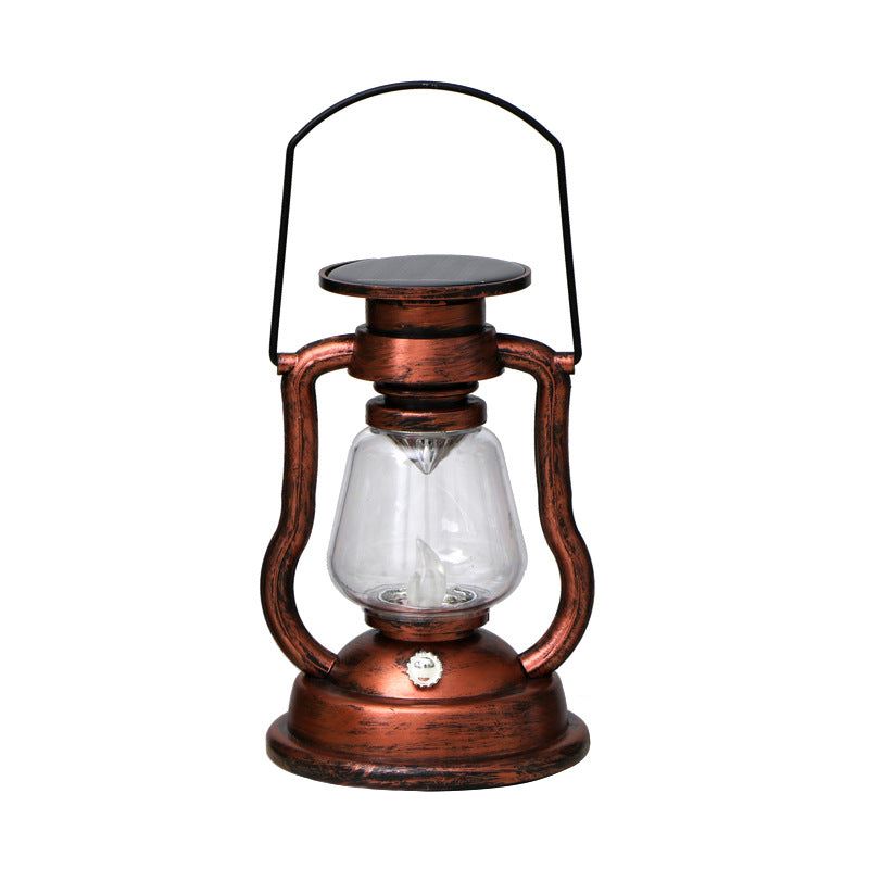 Vintage solar lantern in rust colour as garden decor