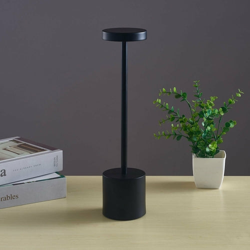 Lumora™ Nordic Touch Bar Lamp in black finish on bedside table