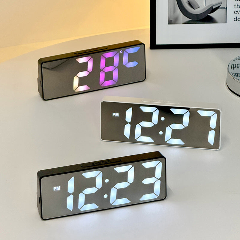 Lumora LED clock showing date, time and room temperature
