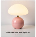 Lumora rechargeable mushroom lamp glowing at night