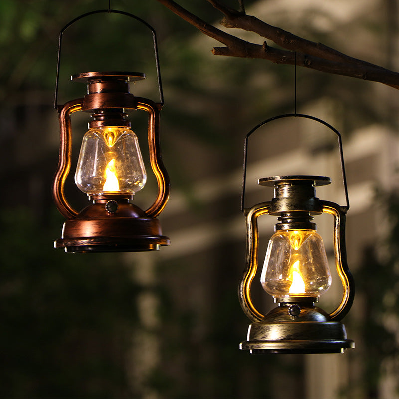 Lumora Vintage Solar LED Lantern with flame effect glowing outdoors